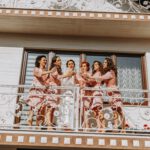 Young,Bridesmaids,Are,Having,Fun,And,Smiling,In,Pink,Silk